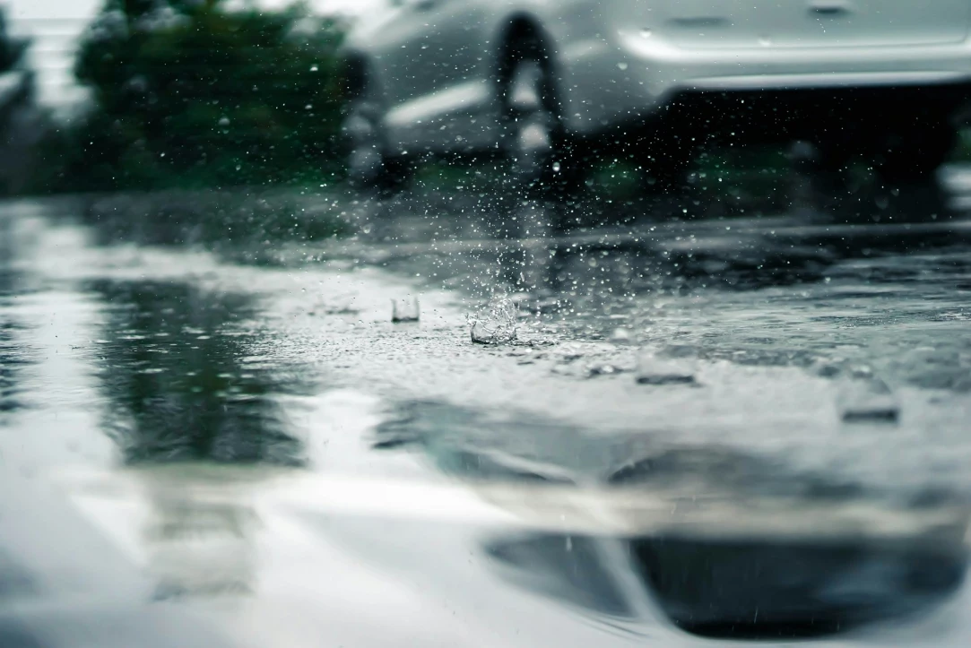 a car driving on a flooded road