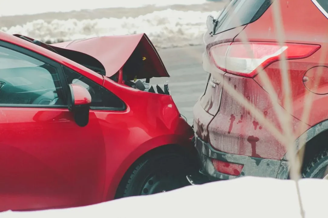 rear-end collision between two red vehicles
